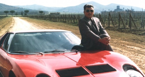 Man Leaning on a Red Car Man Leaning on a Red Car