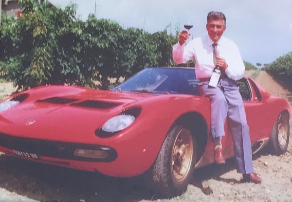 Man with Wine and Classic Lamborghini